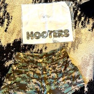 Old hooters military uniform. Xs shorts and xxs shirt. Both brand new.